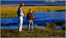 Man fishing with boy